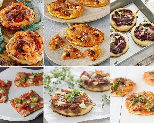 Variedad de mini pizzas caseras: con gambas, queso, tomate, jamón y espárragos. ¡Un festín de mini pizzas!