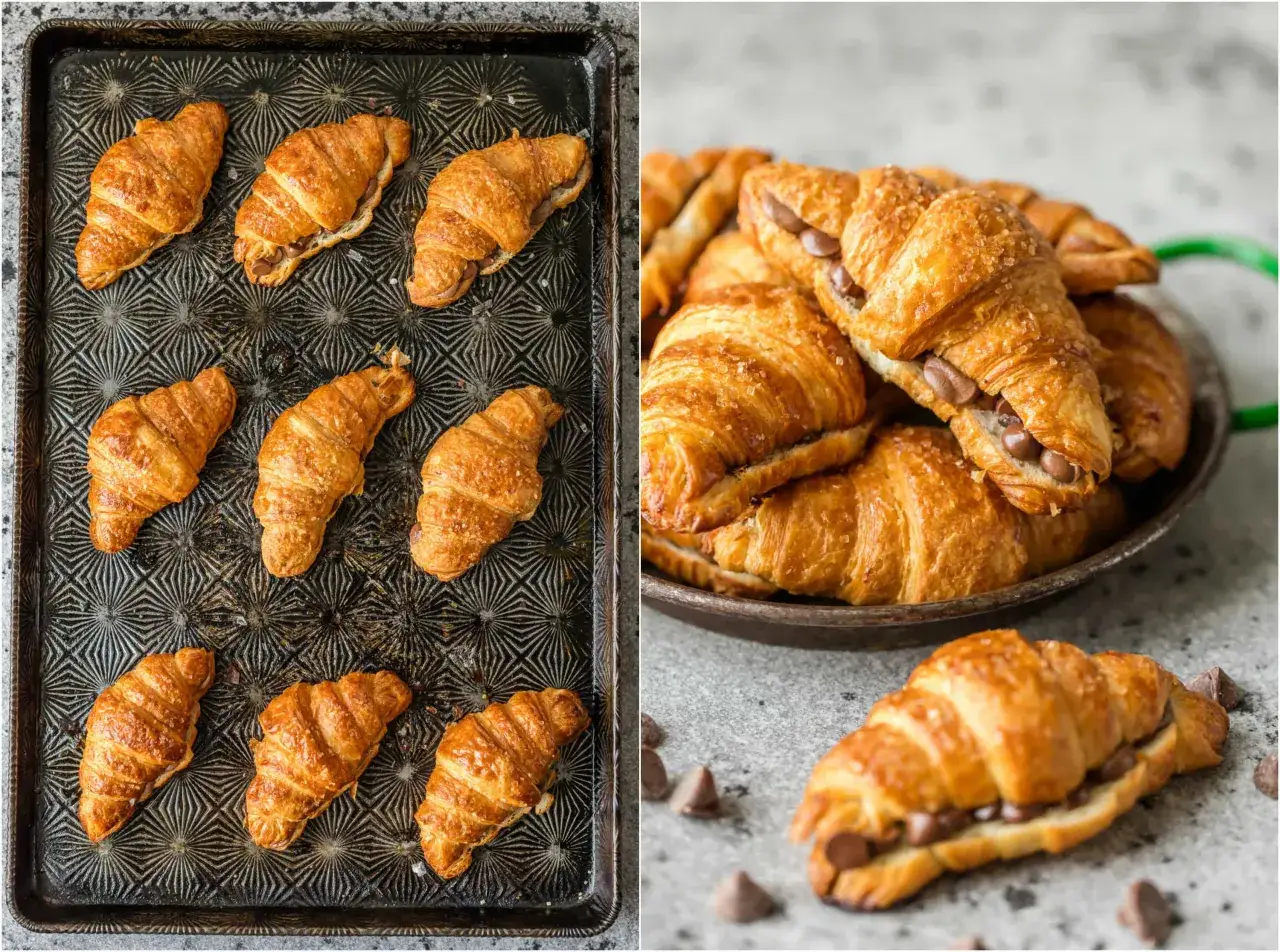 Croissants dorados rellenos de chocolate, algunos en una bandeja, otros apilados en un plato.